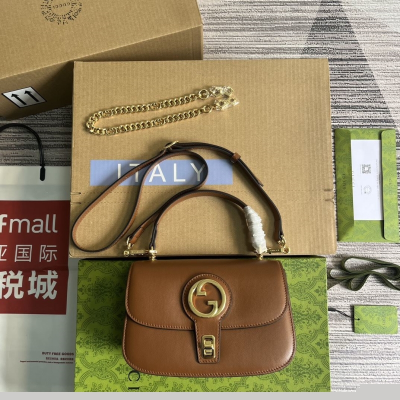 G*u*i top handle bags